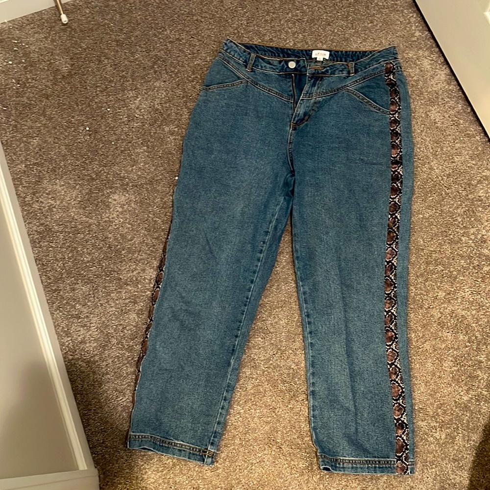 snake patterned high waist jeans